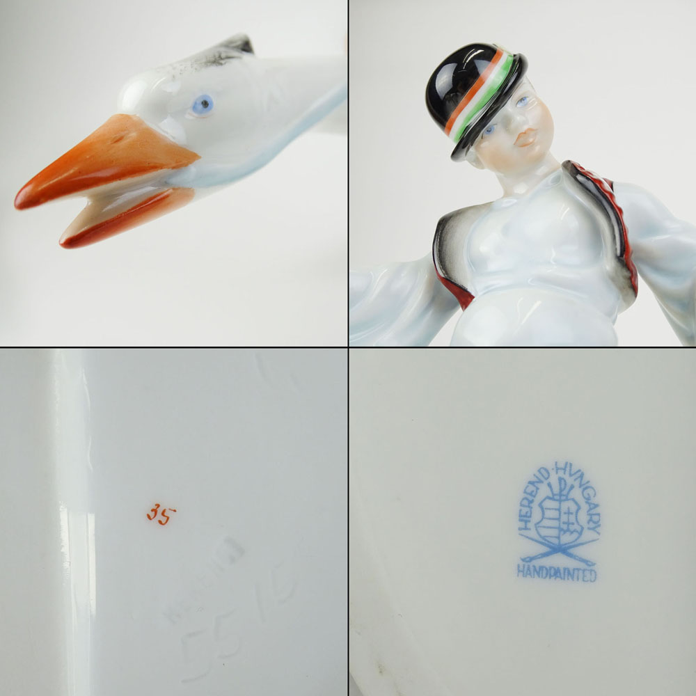 Herend Porcelain Figurine "Boy Riding Goose" Signed with blue Herend backstamp.