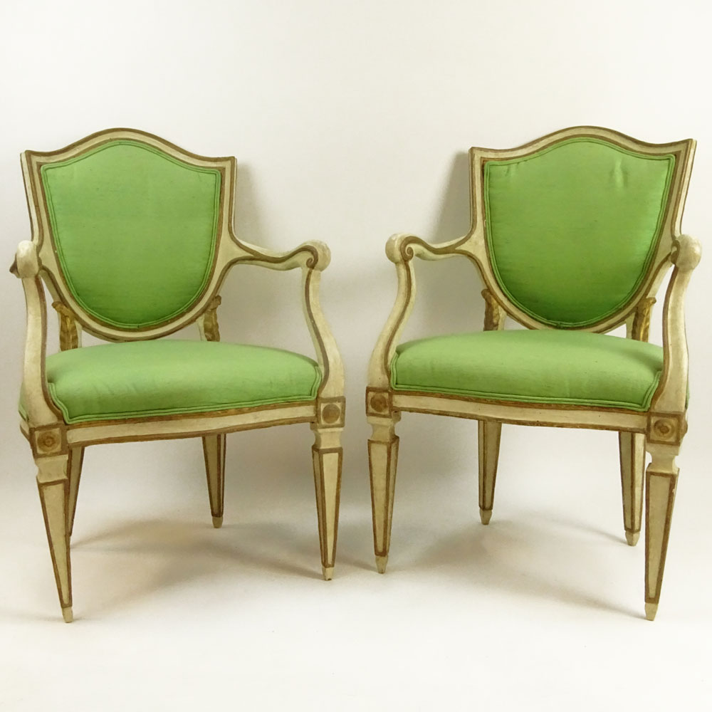 Pair of 19th Century Italian Painted and Parcel Gilt Shield Back Open Arm Chairs