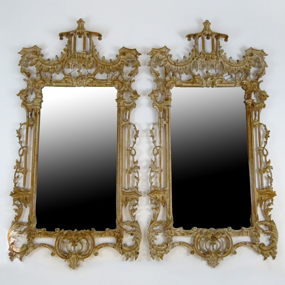 Pair of 20th Century Carved and distress painted Chinoiserie style mirrors.