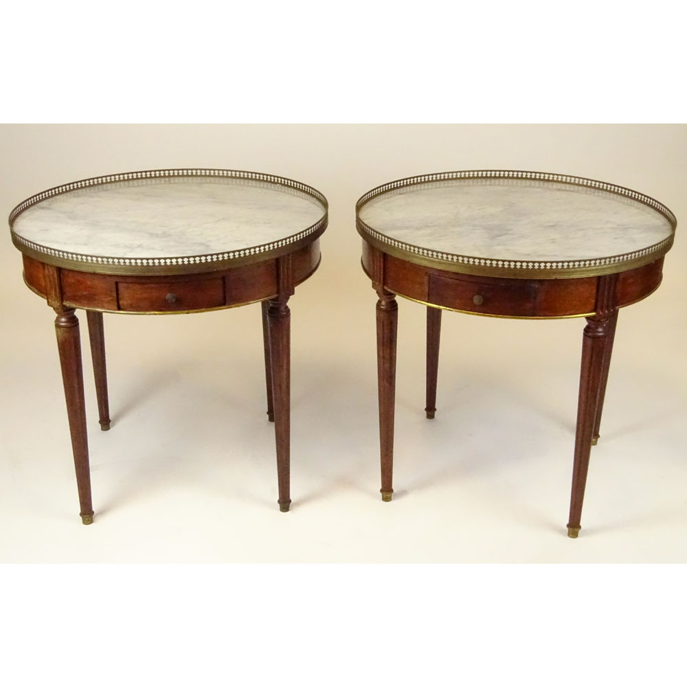 Pair of mid 20th century Italian Louis XVl style mahogany bouillotte tables with marble tops and brass galleries.