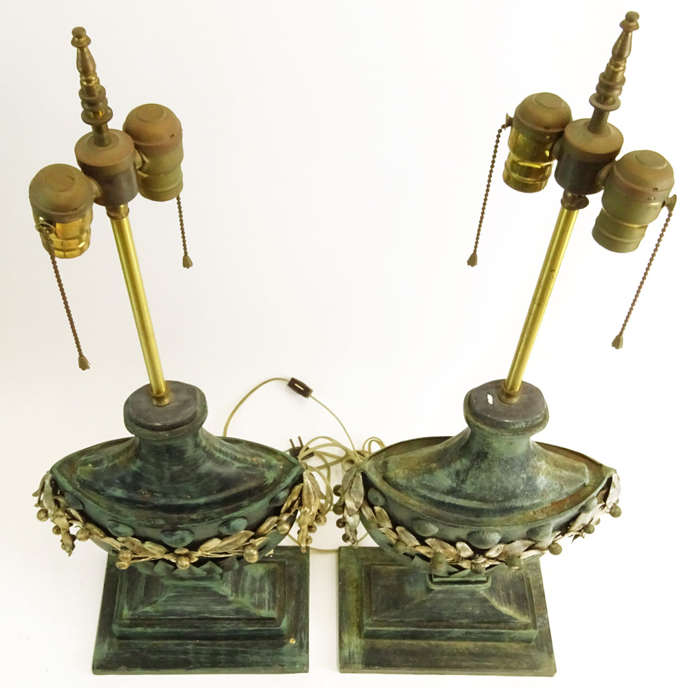 Pair Mid 20th Century urn form tole table lamps.