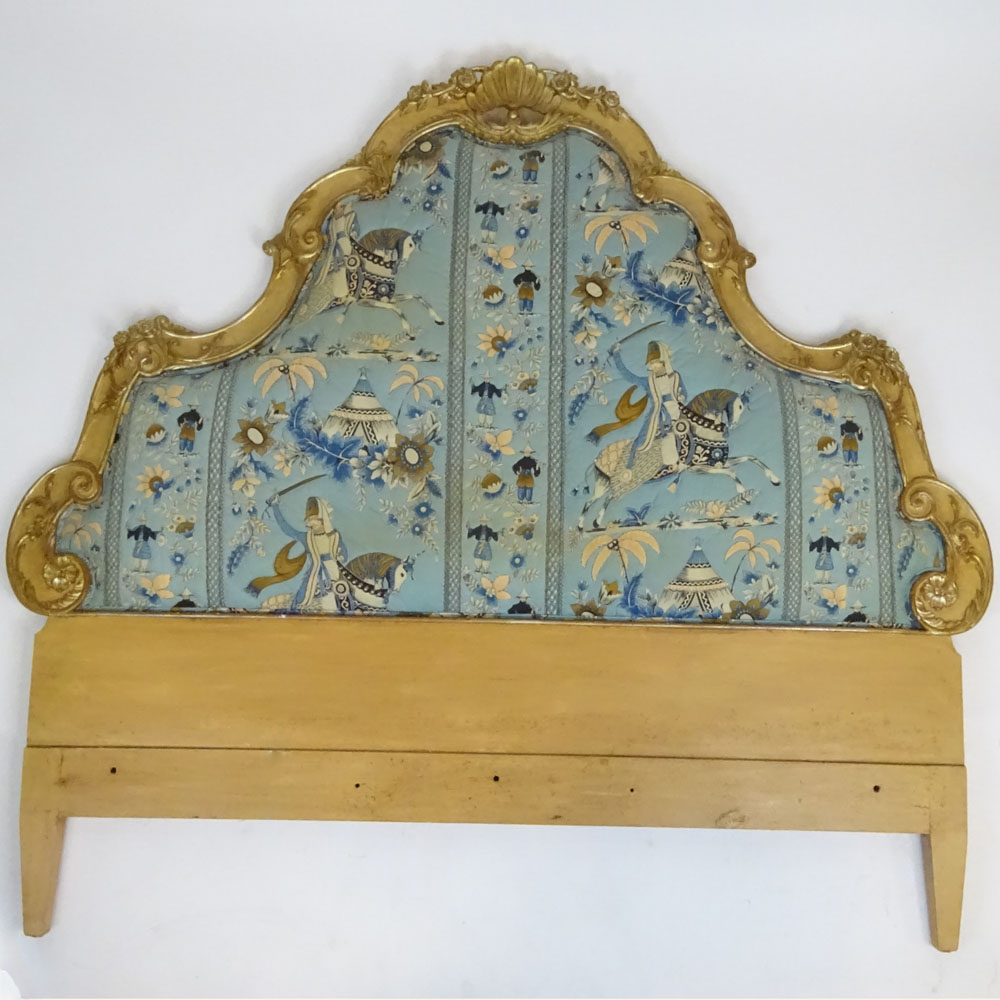 Early to mid 20th century carved painting gilt wood and upholstered headboard.