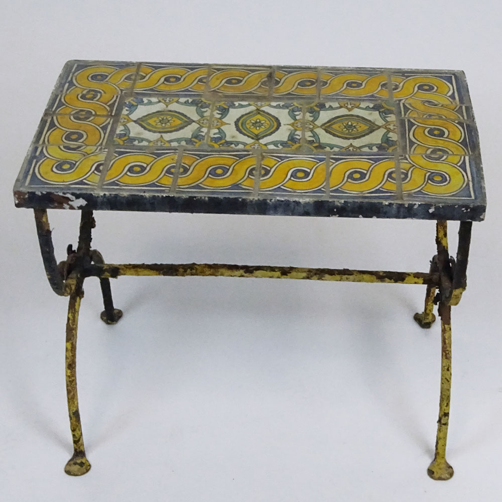 Addison Mizner style circa 1920's glazed terracotta tile and wrought iron garden table.