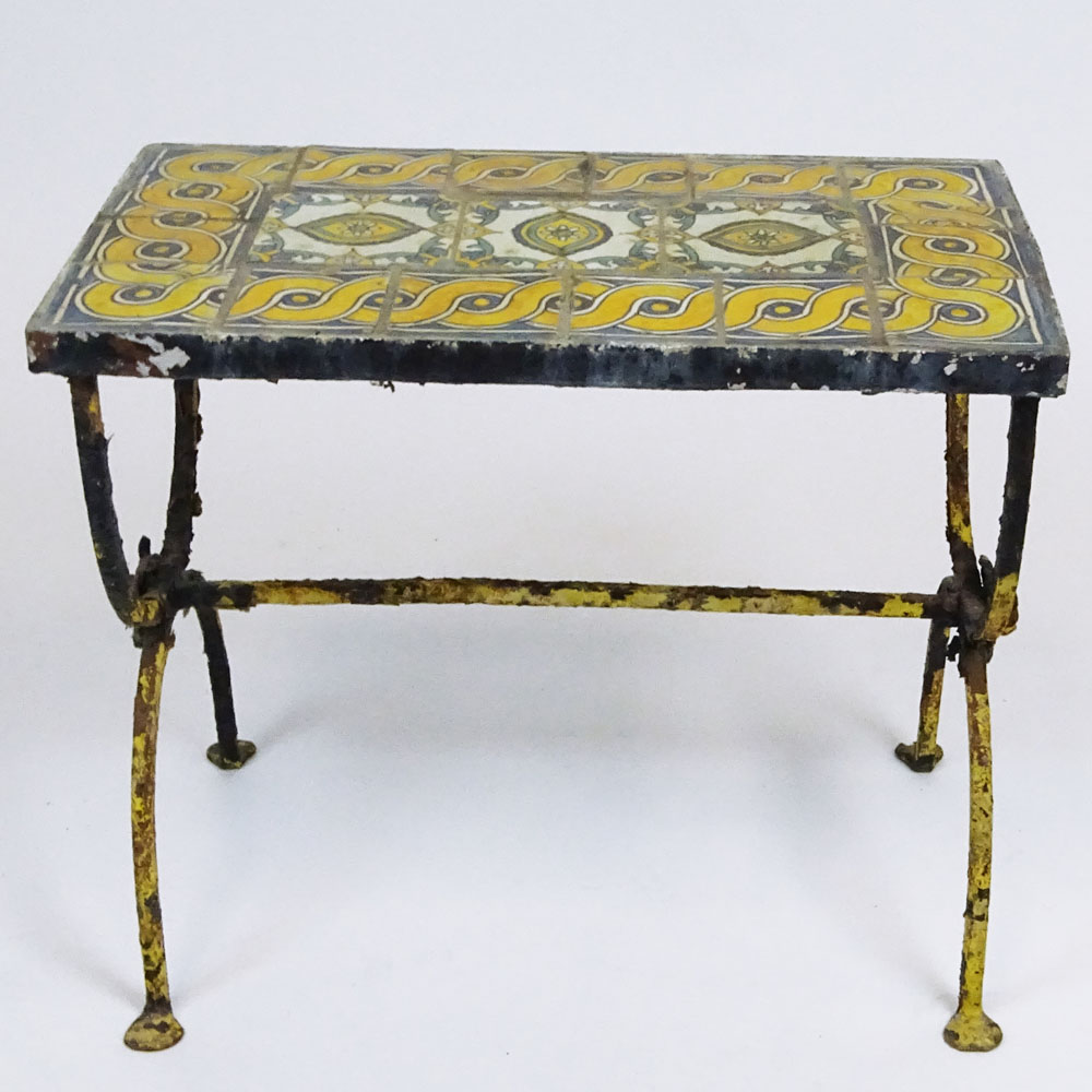 Addison Mizner style circa 1920's glazed terracotta tile and wrought iron garden table.