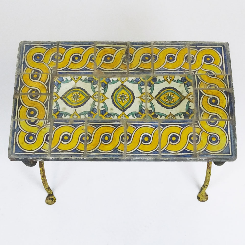 Addison Mizner style circa 1920's glazed terracotta tile and wrought iron garden table.