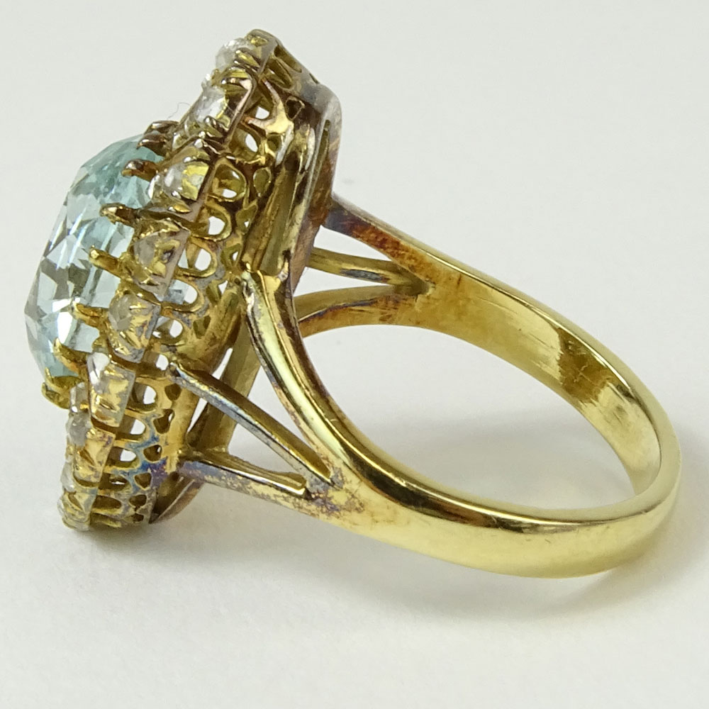 Antique Oval Cut Aquamarine, Rose Cut Diamond and 14 Karat Yellow Gold Ring.