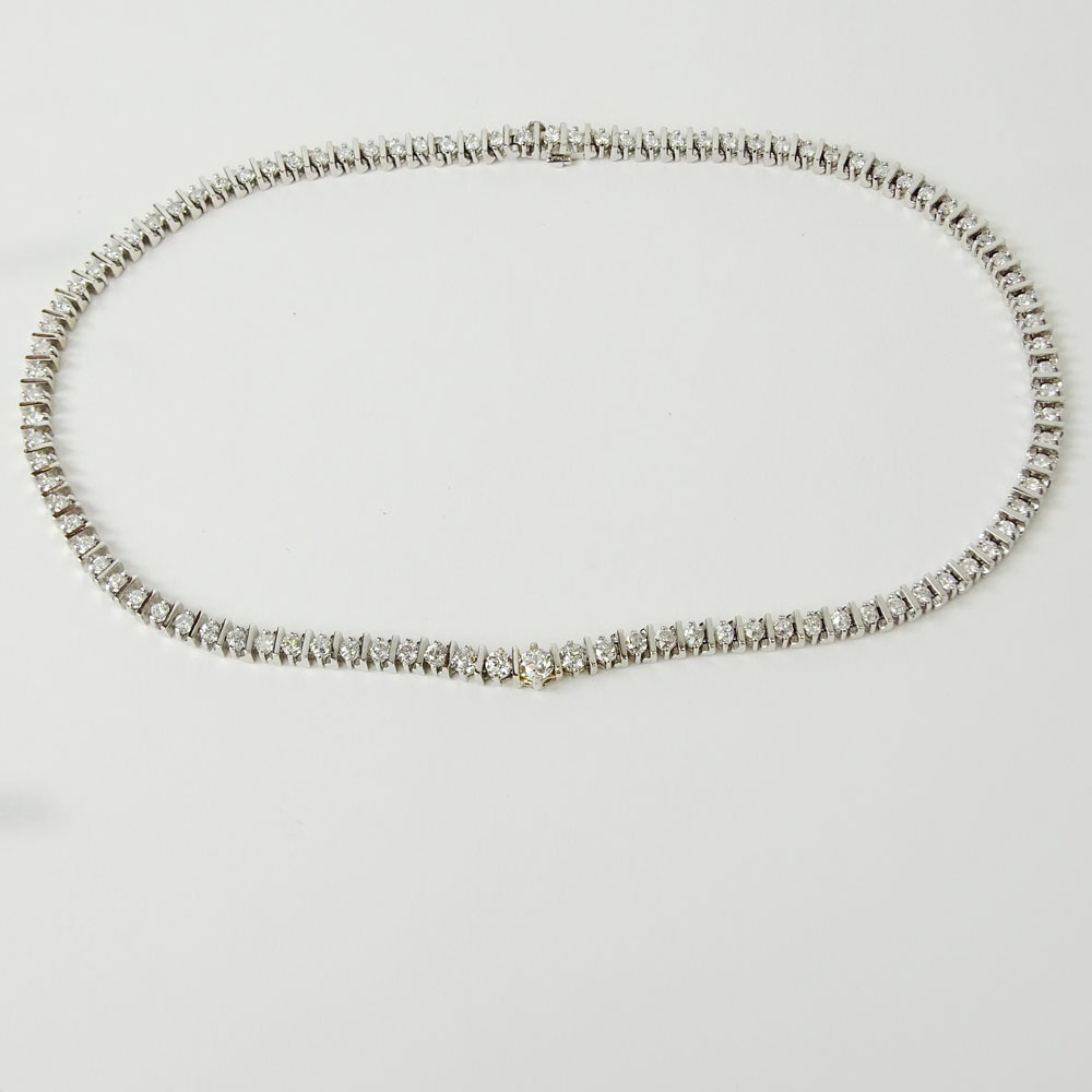Lady's Approx. 3.0 Carat Round Cut Diamond and Platinum Eternity Band.