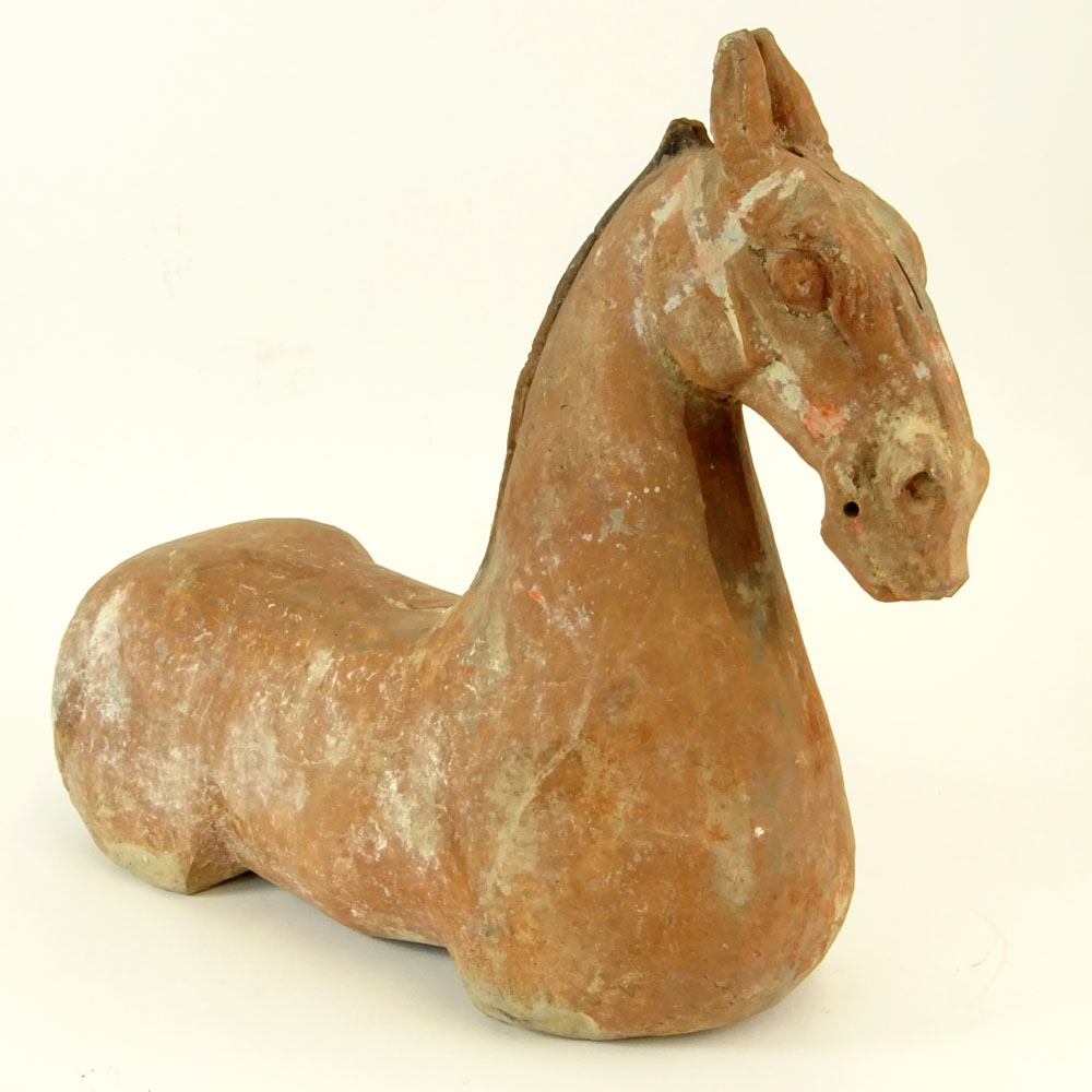 Chinese Han Dynasty Terra Cotta Figure of a Horse with Traces of Pigment.