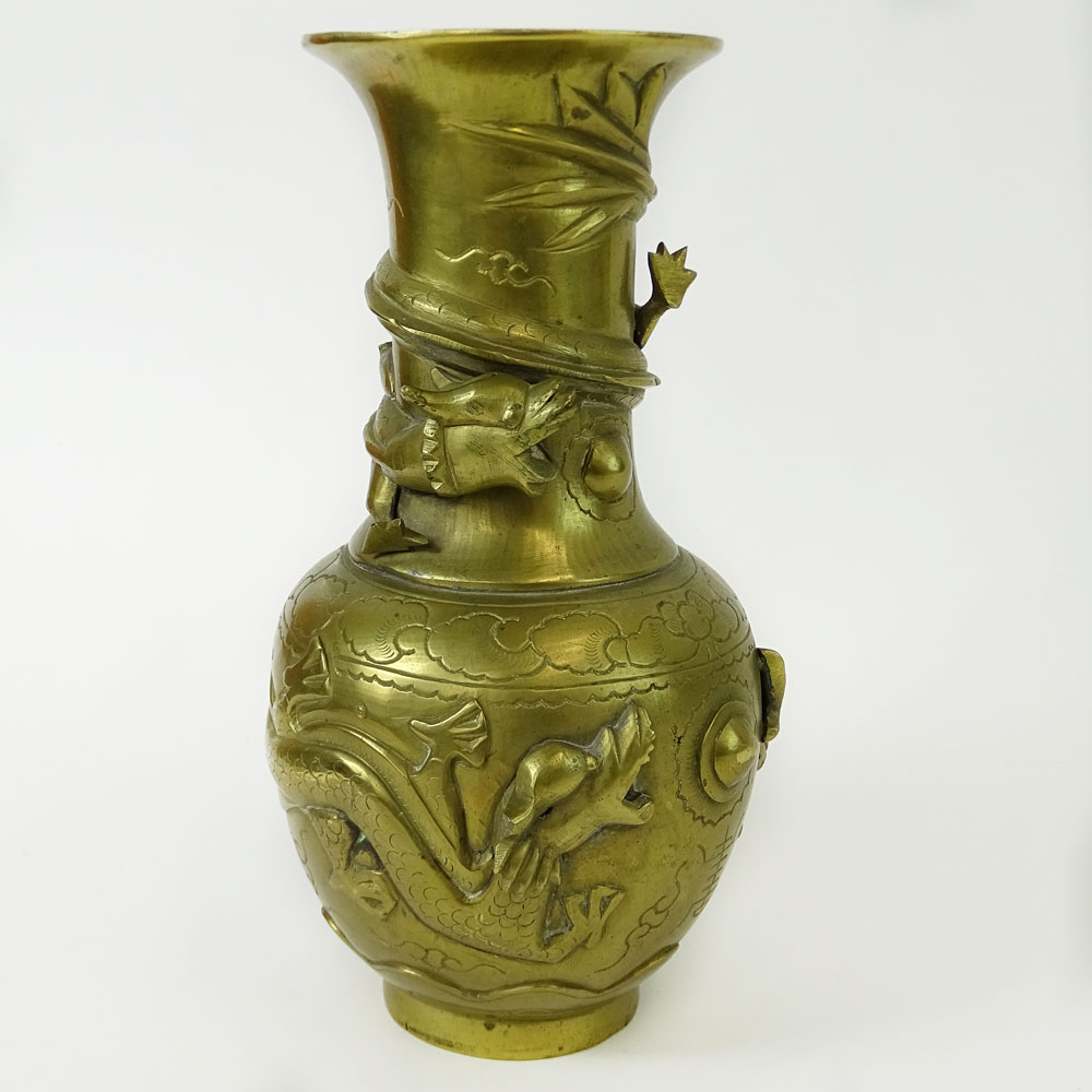 Antique Chinese Brass Relief Vase. Signed with symbols on bottom.