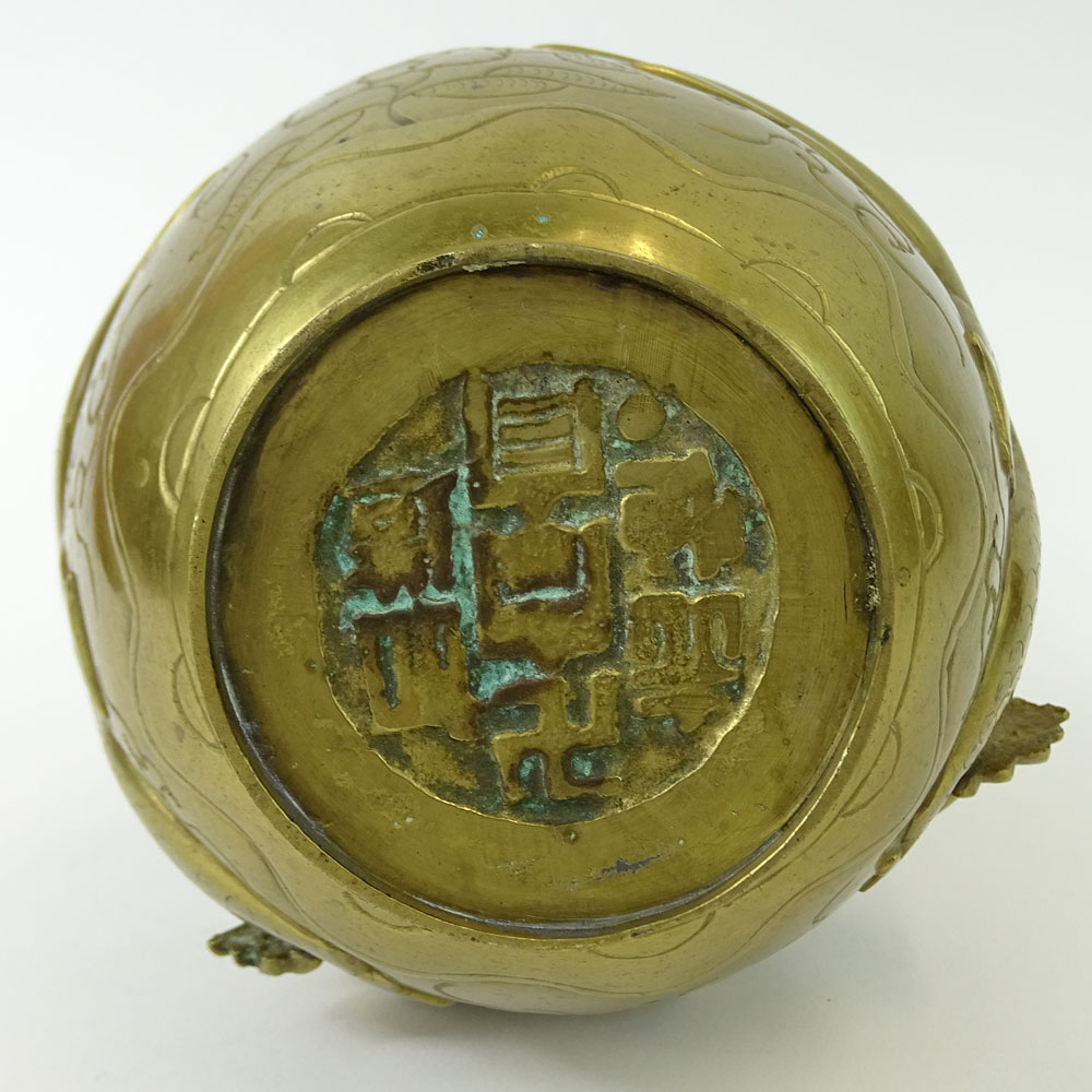 Antique Chinese Brass Relief Vase. Signed with symbols on bottom.