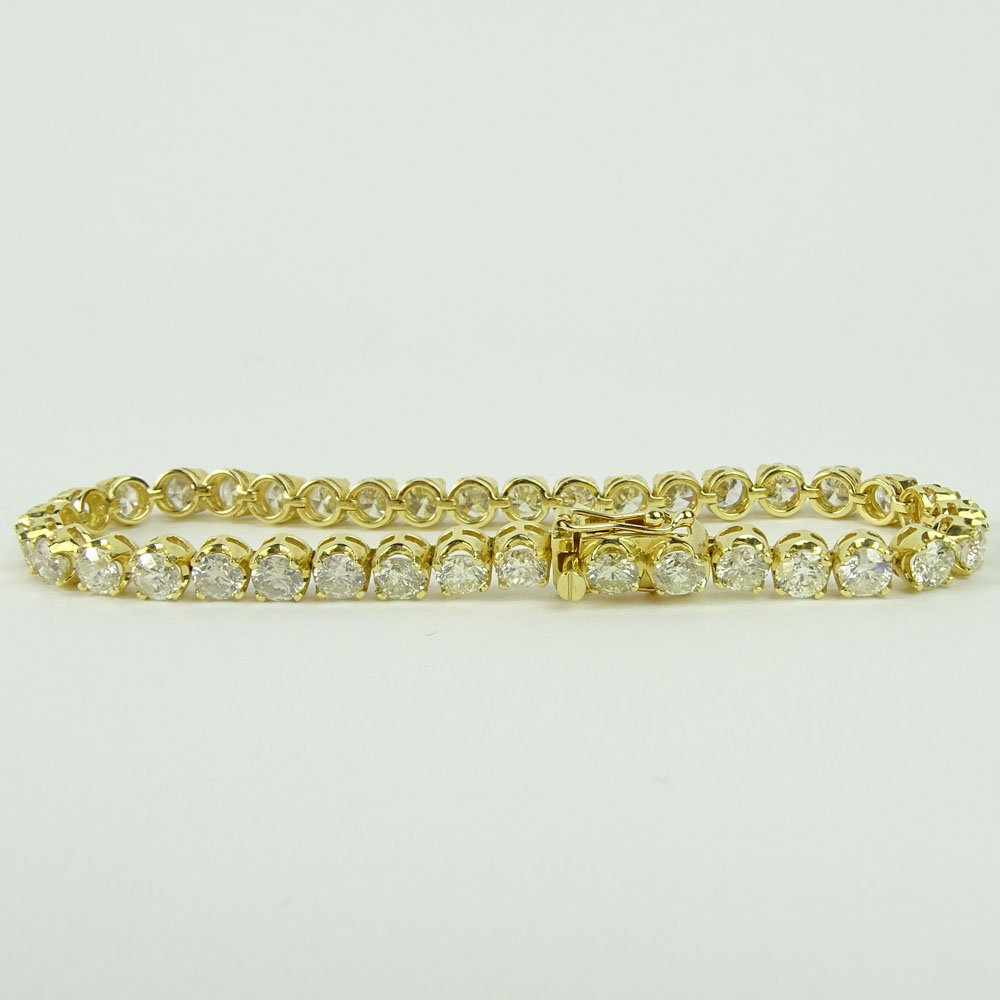 AIG Certified 11.33 Carat Round Cut Diamond and 18 Karat Yellow Gold Tennis Bracelet.