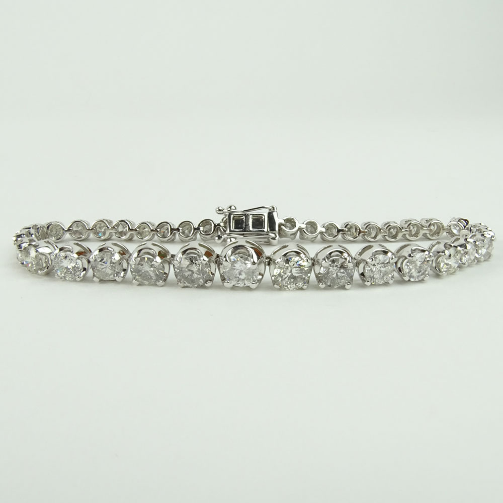 AIG Certified 9.51 Carat Round Cut Diamond and 14 Karat White Gold Tennis Bracelet.