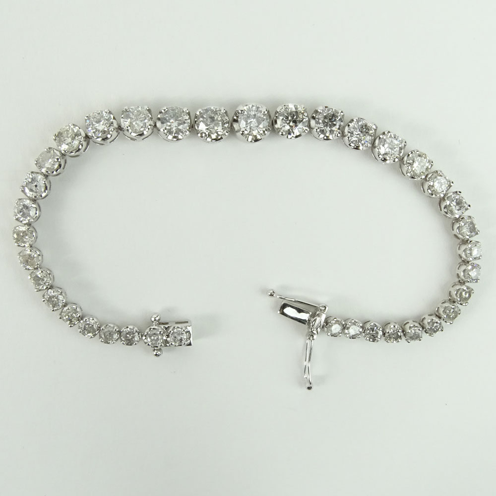 AIG Certified 9.51 Carat Round Cut Diamond and 14 Karat White Gold Tennis Bracelet.