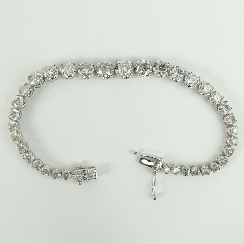 AIG Certified 9.51 Carat Round Cut Diamond and 14 Karat White Gold Tennis Bracelet.