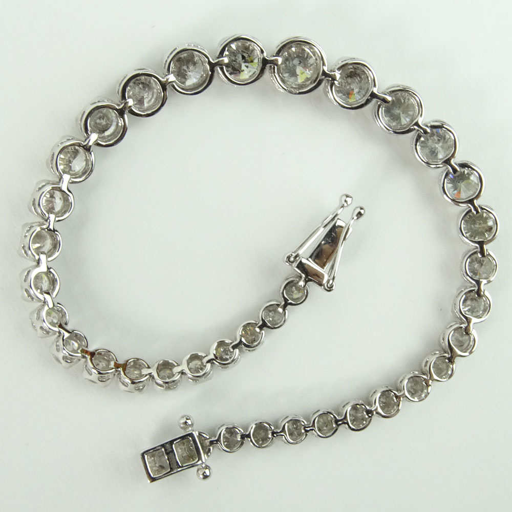 AIG Certified 9.51 Carat Round Cut Diamond and 14 Karat White Gold Tennis Bracelet.