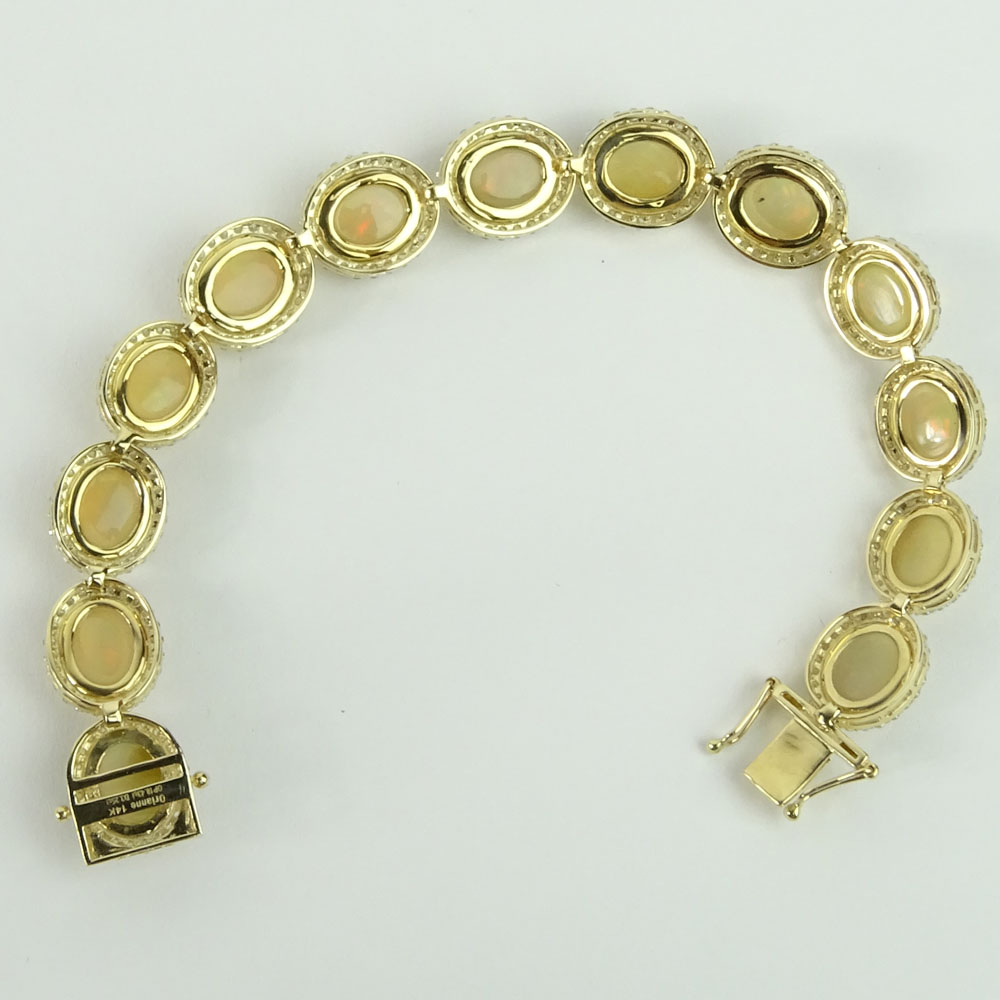 AIG Certified 18.43 Carat Cabochon Opal, 3.25 carat Round Cut Diamond and 14 Karat Yellow Gold Bracelet. 