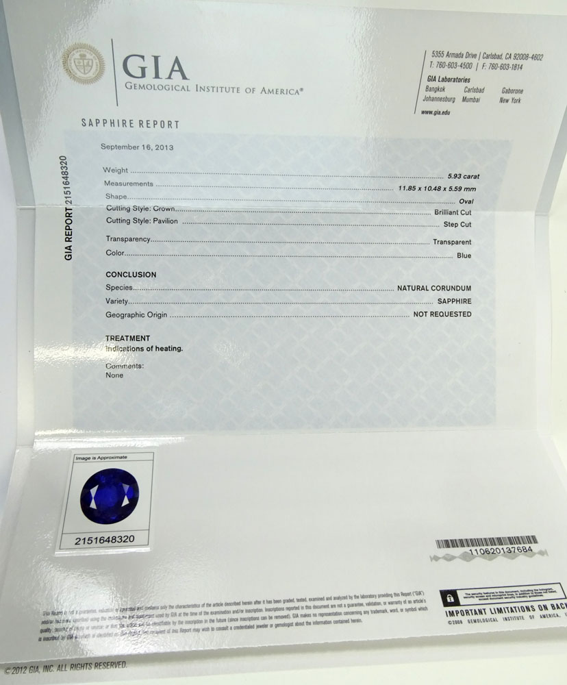 GIA Certified 5.93 Carat Ceylon Sapphire and Round Brilliant Cut and Marquise Cut Diamonds Weighing approximately 3.00 Carats Mounted in an Italian Platinum Lady's Ring.