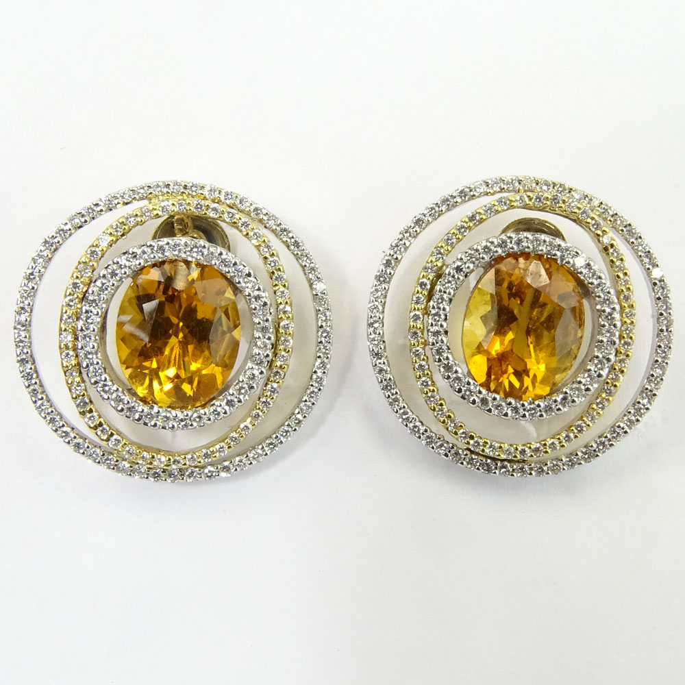 Pair of Oval Cut Citrine and 18 Karat Yellow and White Gold Earrings.