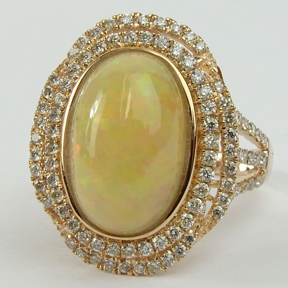 5.0 Carat Cabochon Opal, .88 Carat Round Cut Diamond and 14 Karat Rose Gold Ring.