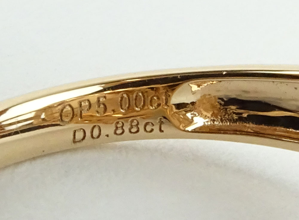 5.0 Carat Cabochon Opal, .88 Carat Round Cut Diamond and 14 Karat Rose Gold Ring.