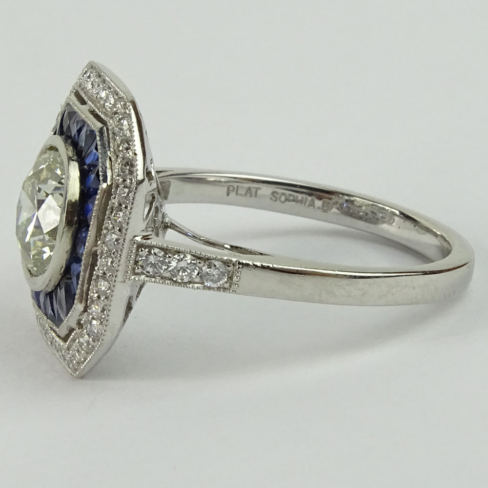 Lady's Approx. 1.35 Carat Round Brilliant Cut Diamond, .85 Carat Sapphire and Platinum Ring accented with .35 Carat Round Brilliant Cut Diamonds