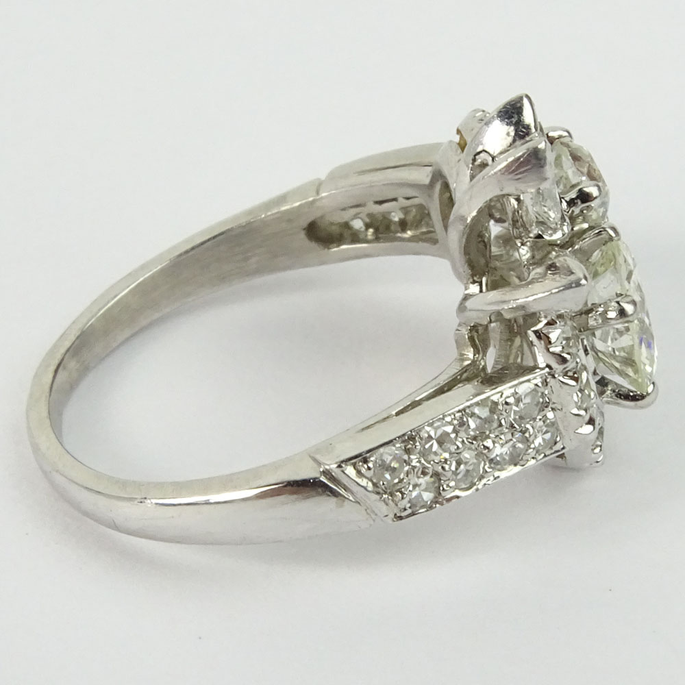 Lady's Vintage Diamond and 18 Karat White Gold Cluster Ring with Center Approx. .90 Carat Round Cut Diamond.