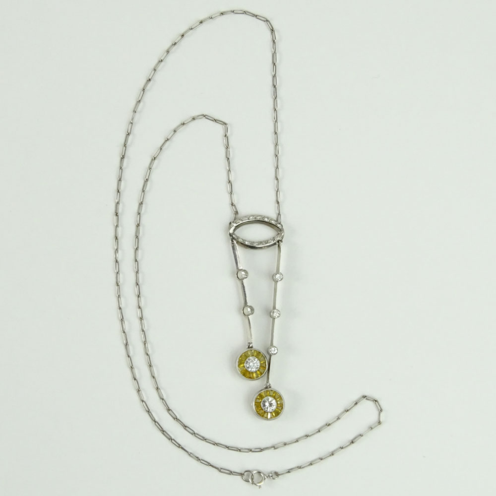 Diamond, Yellow Sapphire and 14 Karat White Gold Necklace.