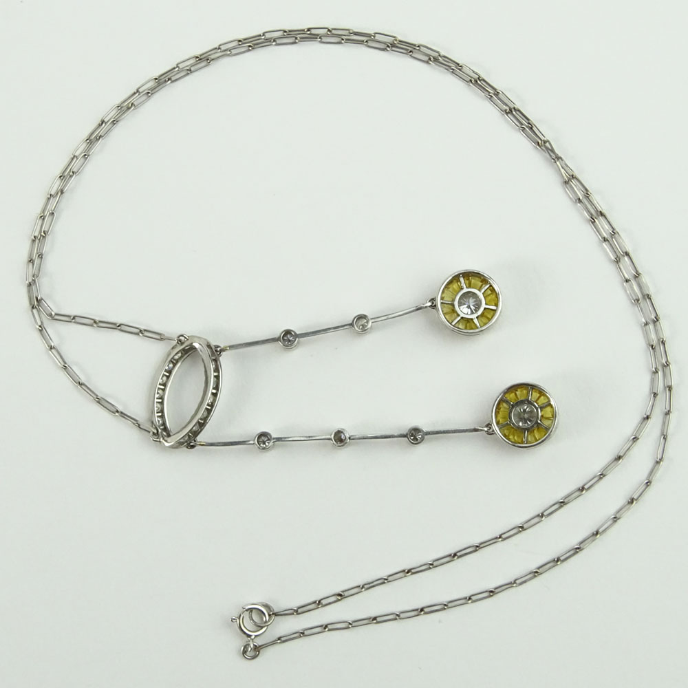 Diamond, Yellow Sapphire and 14 Karat White Gold Necklace.