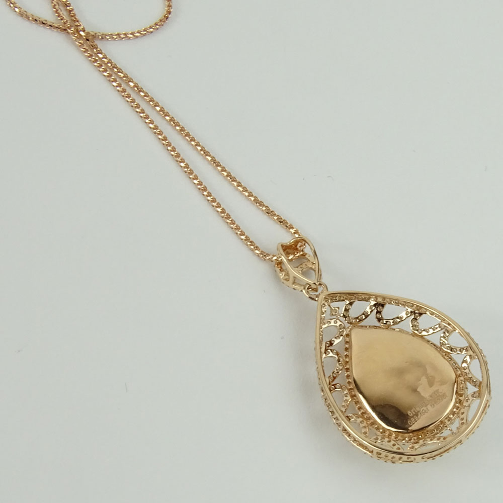 AIG Certified 9.45 Carat Pear Shape Opal, 1.27 Carat Round Cut Diamond and 14 Karat Rose Gold Pendant Necklace. 