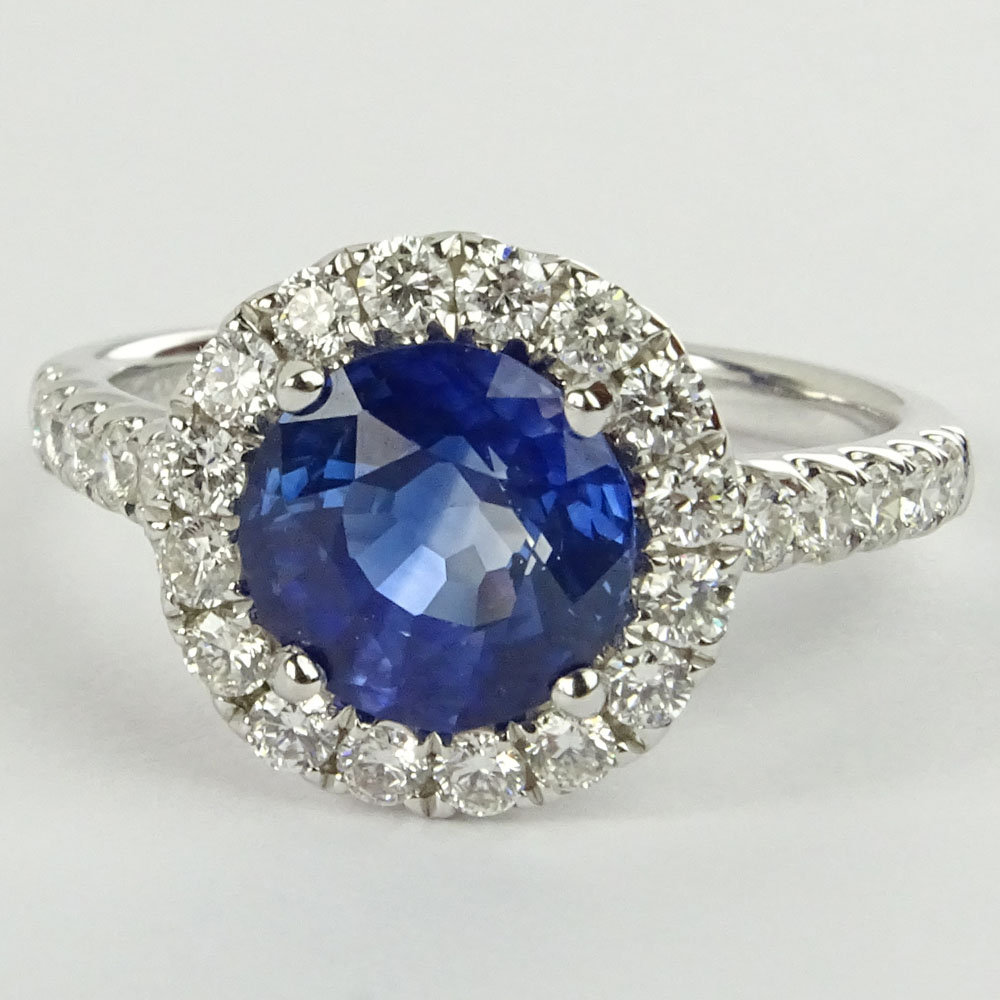 AIG Certified 2.67 Carat Natural Sapphire, .67 Carat Round Cut Diamond and 18 Karat White Gold Ring. 