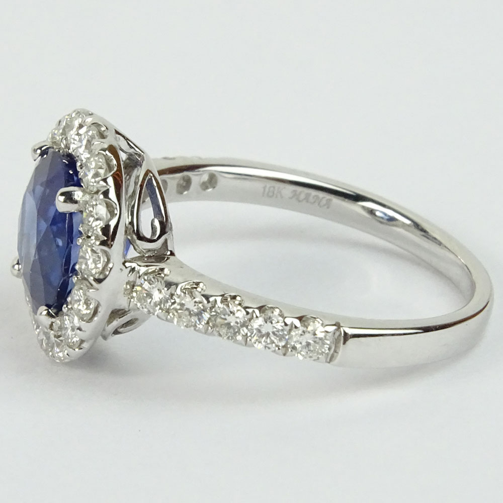 AIG Certified 2.67 Carat Natural Sapphire, .67 Carat Round Cut Diamond and 18 Karat White Gold Ring. 