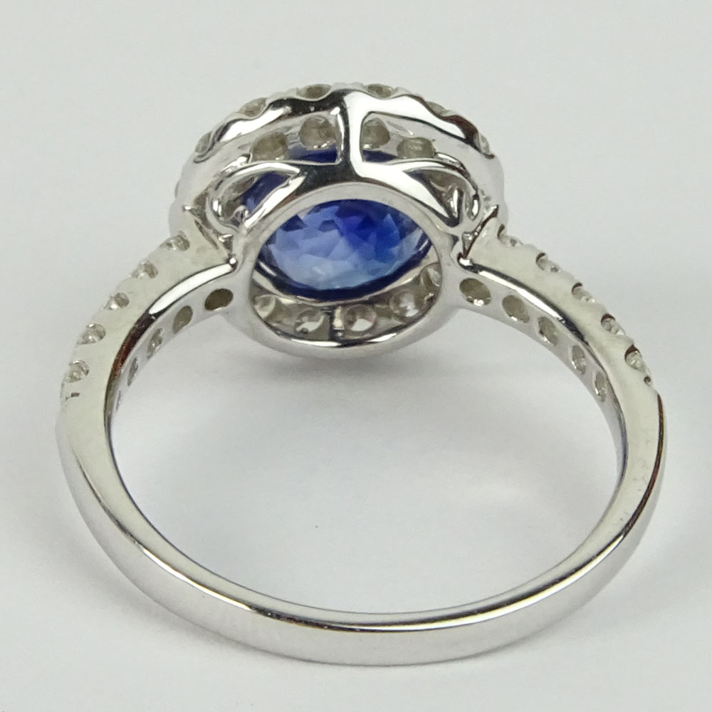 AIG Certified 2.67 Carat Natural Sapphire, .67 Carat Round Cut Diamond and 18 Karat White Gold Ring. 