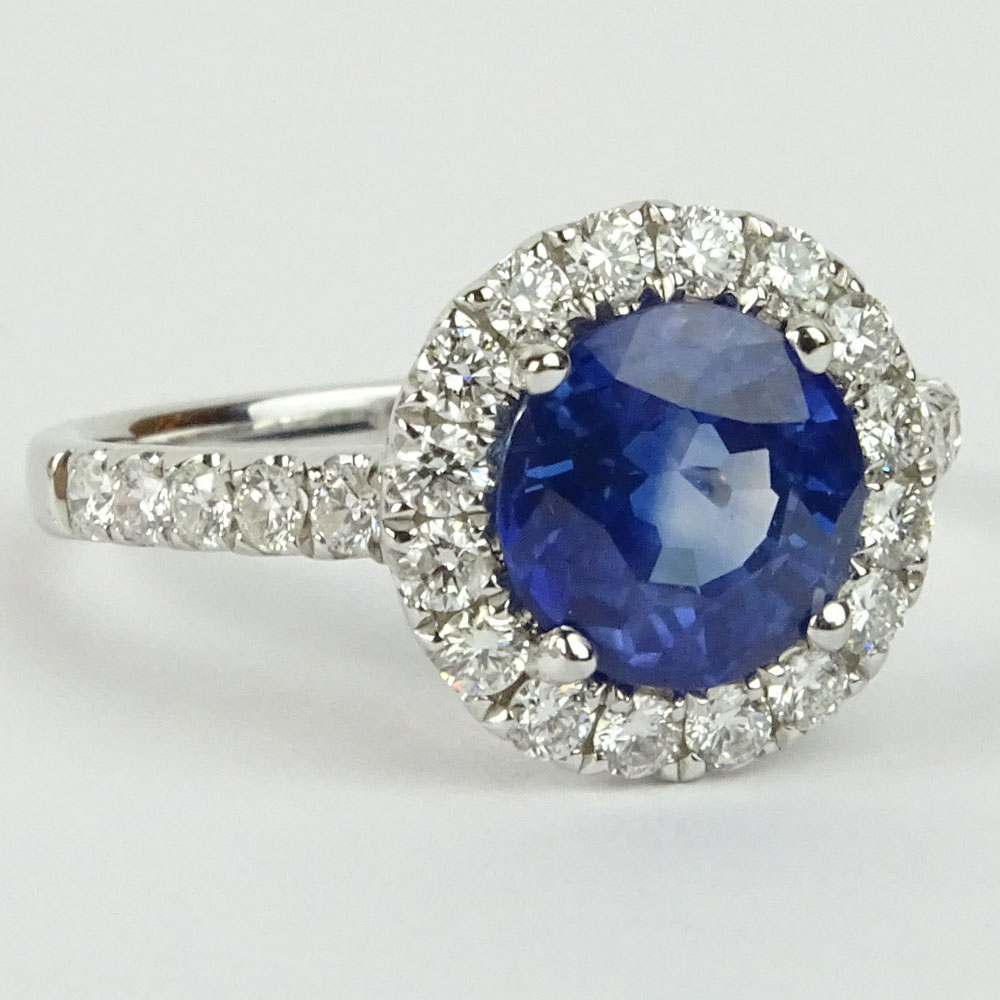 AIG Certified 2.67 Carat Natural Sapphire, .67 Carat Round Cut Diamond and 18 Karat White Gold Ring. 