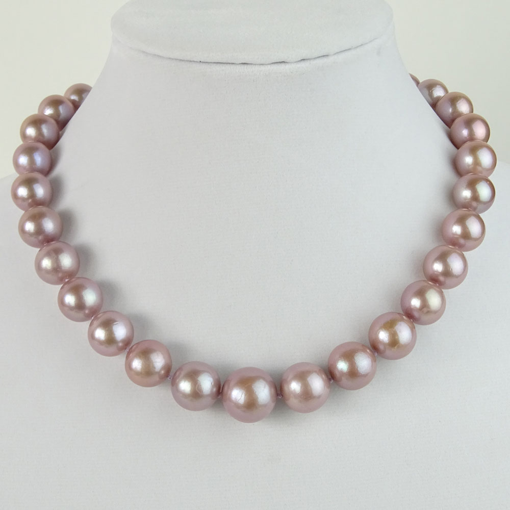 Single Strand Graduated Lavender Pearl Necklace with 14 Karat White Gold Clasp.