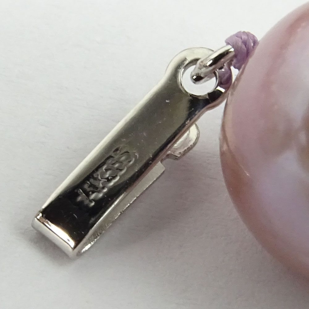 Single Strand Graduated Lavender Pearl Necklace with 14 Karat White Gold Clasp.