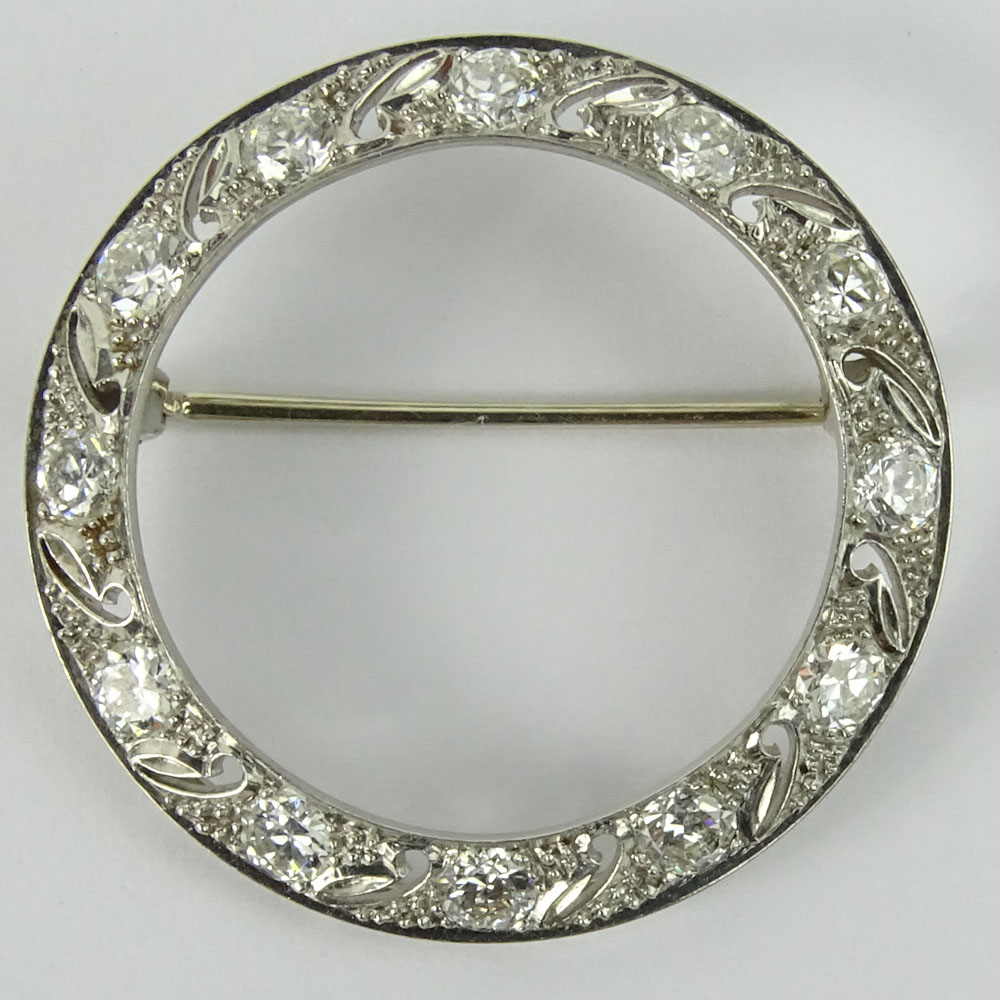 Antique Approx. 3.0 Carat Round Cut Diamond and 14 Karat White Gold Circle Brooch.