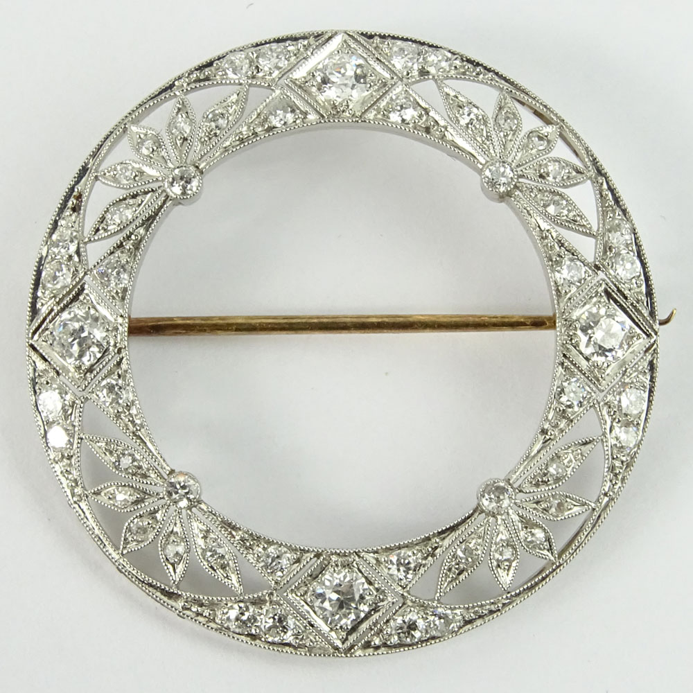 Edwardian Circa 1900-1910 Approx. 1.50-1.75 Carat Old Mine Cut Diamond and Platinum Filigree Brooch.