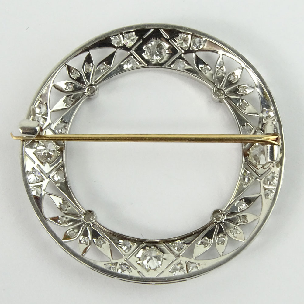 Edwardian Circa 1900-1910 Approx. 1.50-1.75 Carat Old Mine Cut Diamond and Platinum Filigree Brooch.