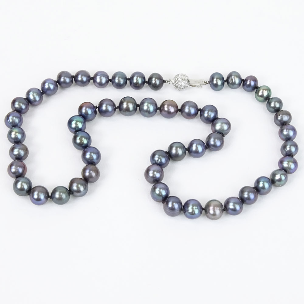 Lady's Black Pearl Necklace with Diamond and 14 Karat White Gold Clasp.