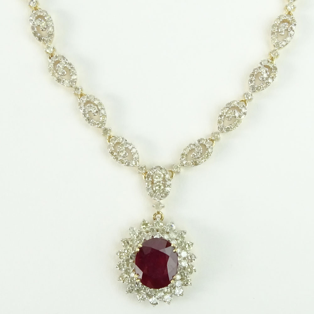 AIG Certified 6.96 Carat Oval Cut Ruby, 9.95 Carat Round Cut Diamond and 14 Karat Yellow Gold Necklace. 