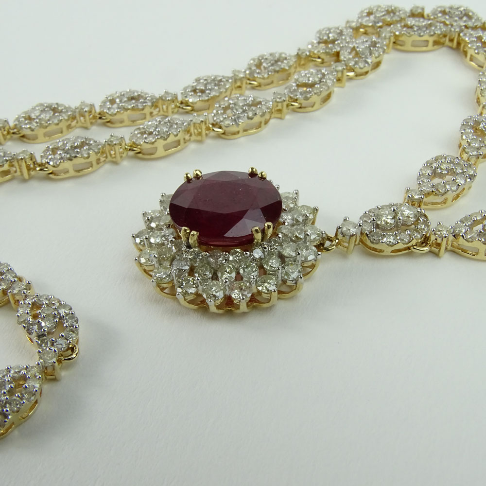 AIG Certified 6.96 Carat Oval Cut Ruby, 9.95 Carat Round Cut Diamond and 14 Karat Yellow Gold Necklace. 