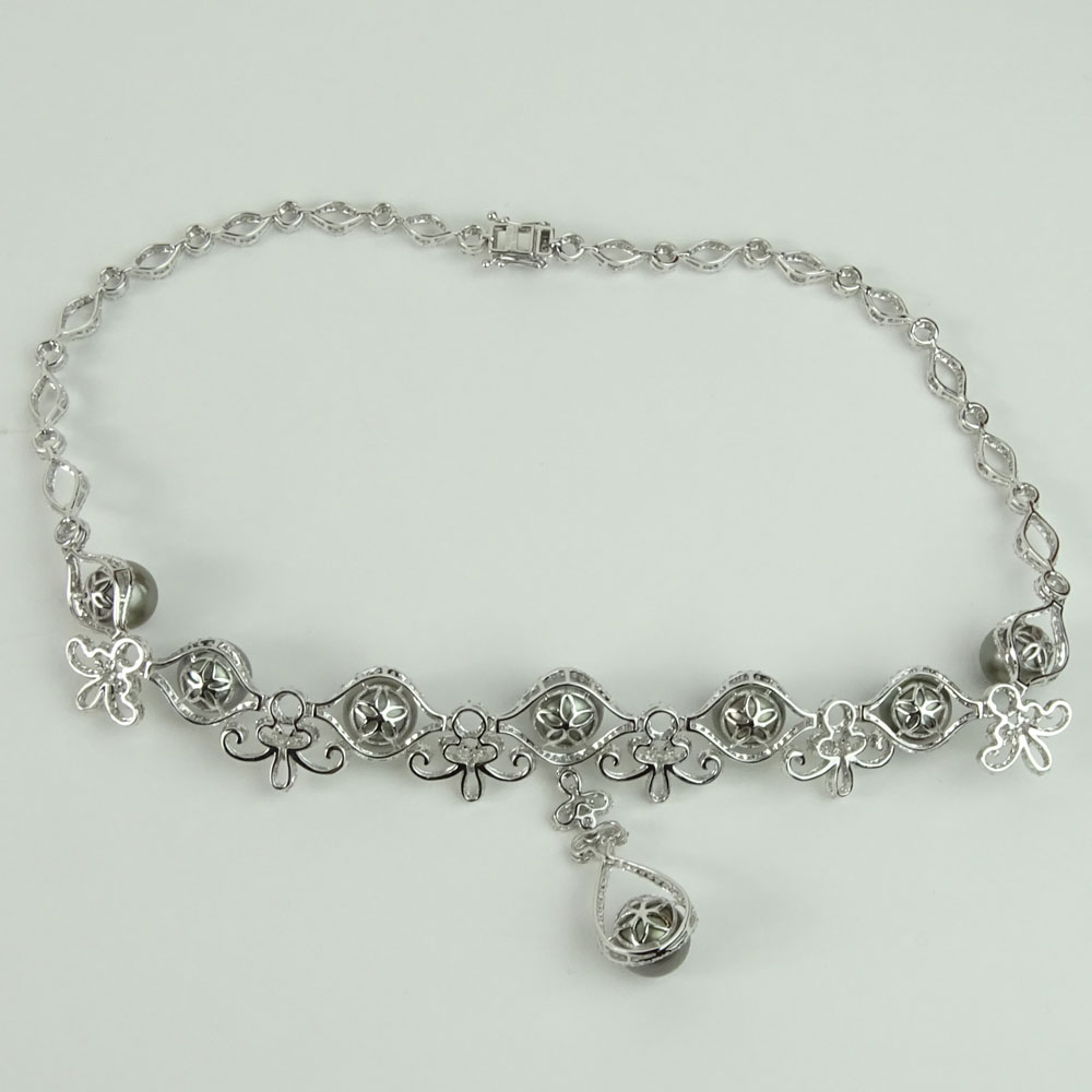 Tahitian Black Pearl, 9.48 Carat Round Cut Diamond and 14 Karat White Gold Necklace. 