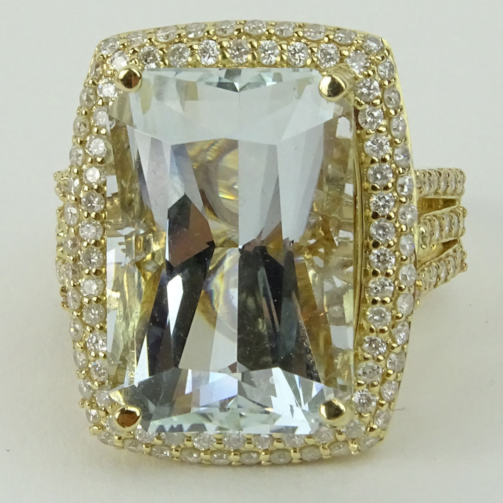 GIA Certified 15.37 Carat Aquamarine, 1.22 Carat Round Cut Diamond and 14 Karat Yellow Gold Ring. 