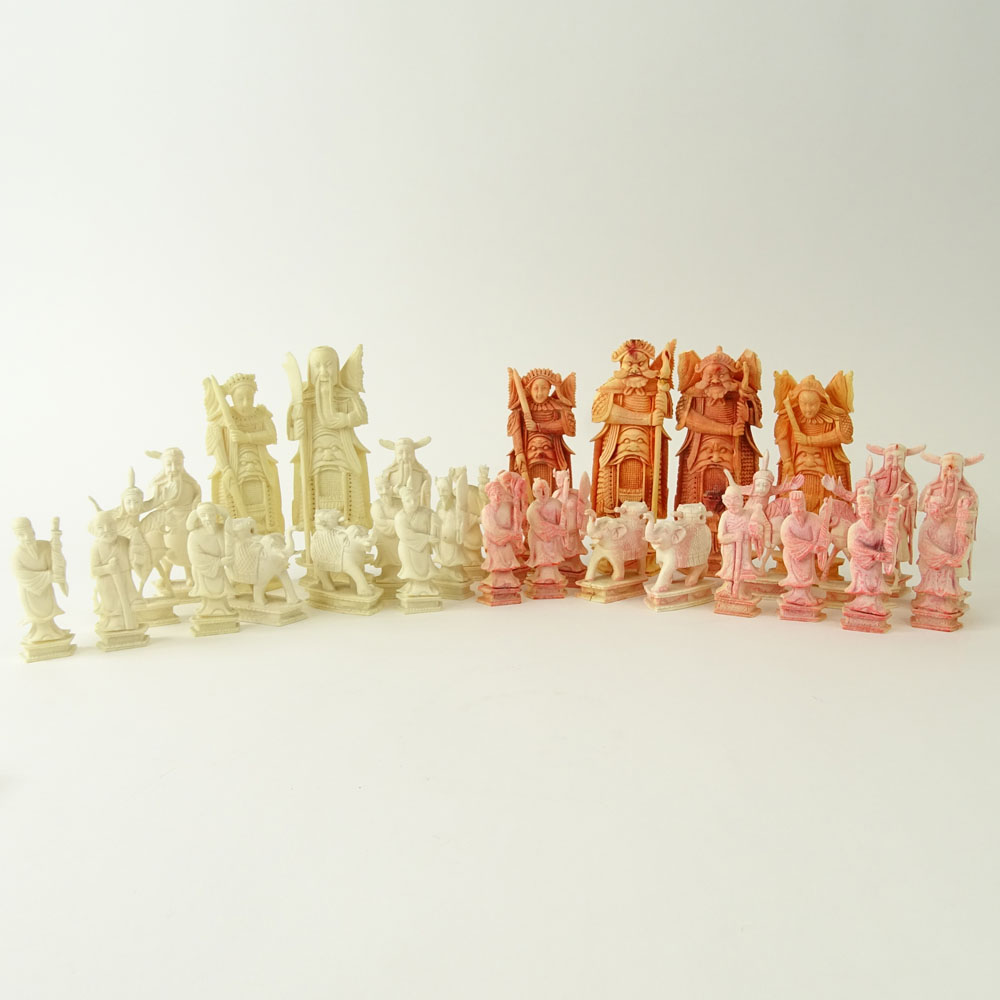 Lot of 32 Carved Ivory Chess Pieces (14 white, 18 colored).