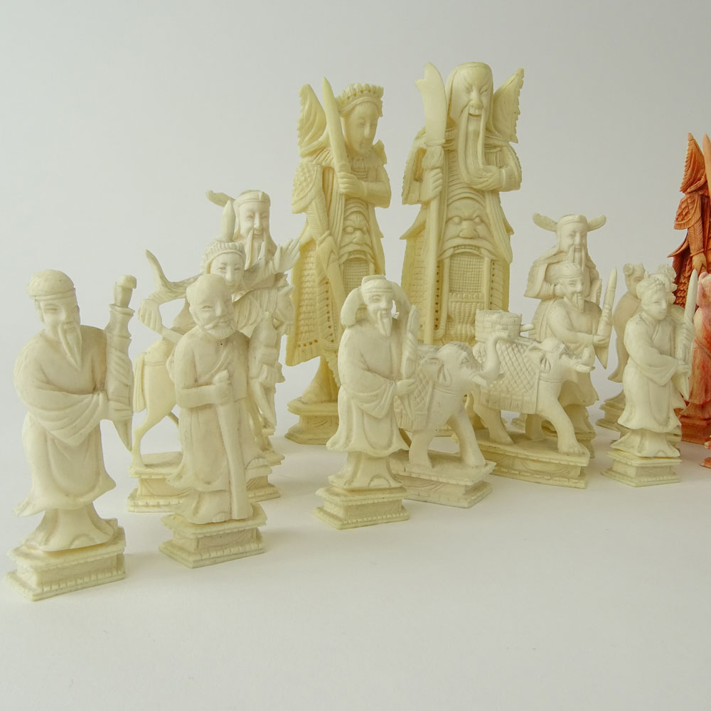 Lot of 32 Carved Ivory Chess Pieces (14 white, 18 colored).