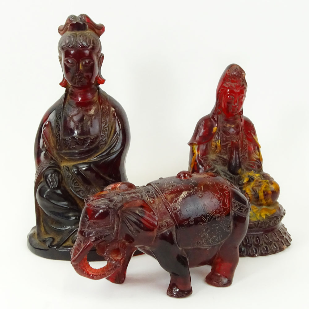 Lot of Three (3) Vintage Carved Amber Deity Figurines.