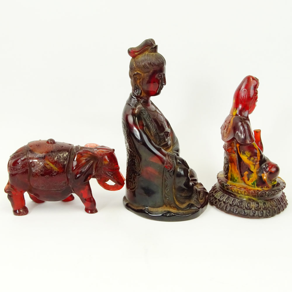 Lot of Three (3) Vintage Carved Amber Deity Figurines.