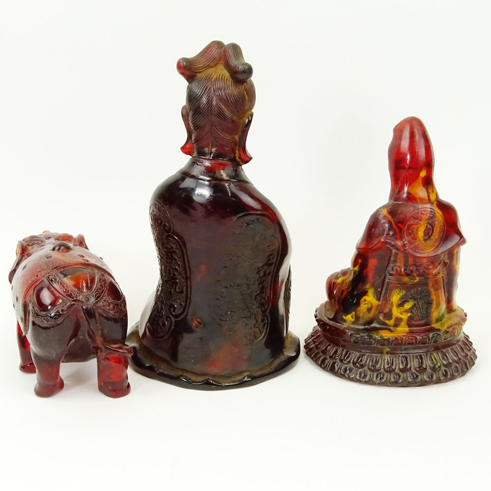 Lot of Three (3) Vintage Carved Amber Deity Figurines.