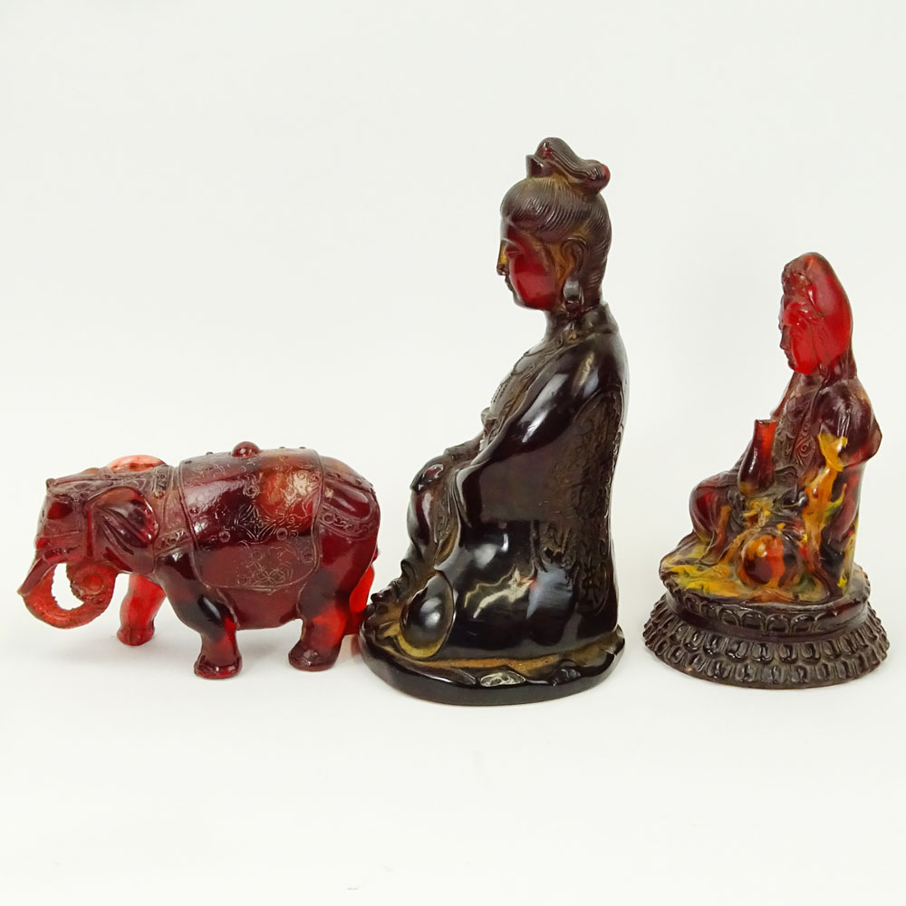 Lot of Three (3) Vintage Carved Amber Deity Figurines.