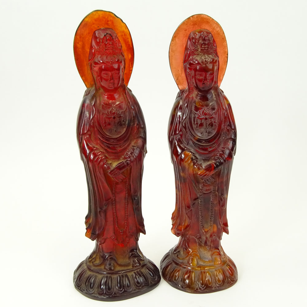 Pair of Vintage Carved Amber Deity Figurines.
